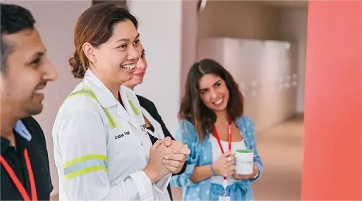 Employees communicating at work